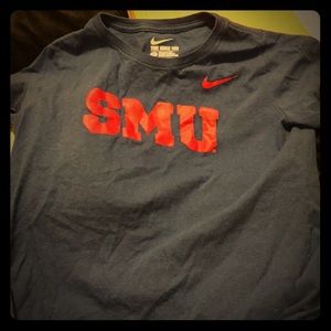 A blue t-shirt, Size M, and red lettering on front